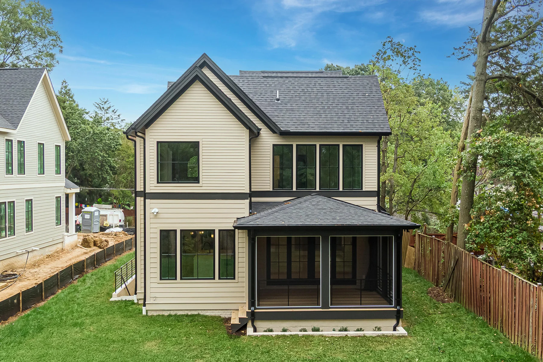 Arlington New Home Harper Plan back yard view with patio