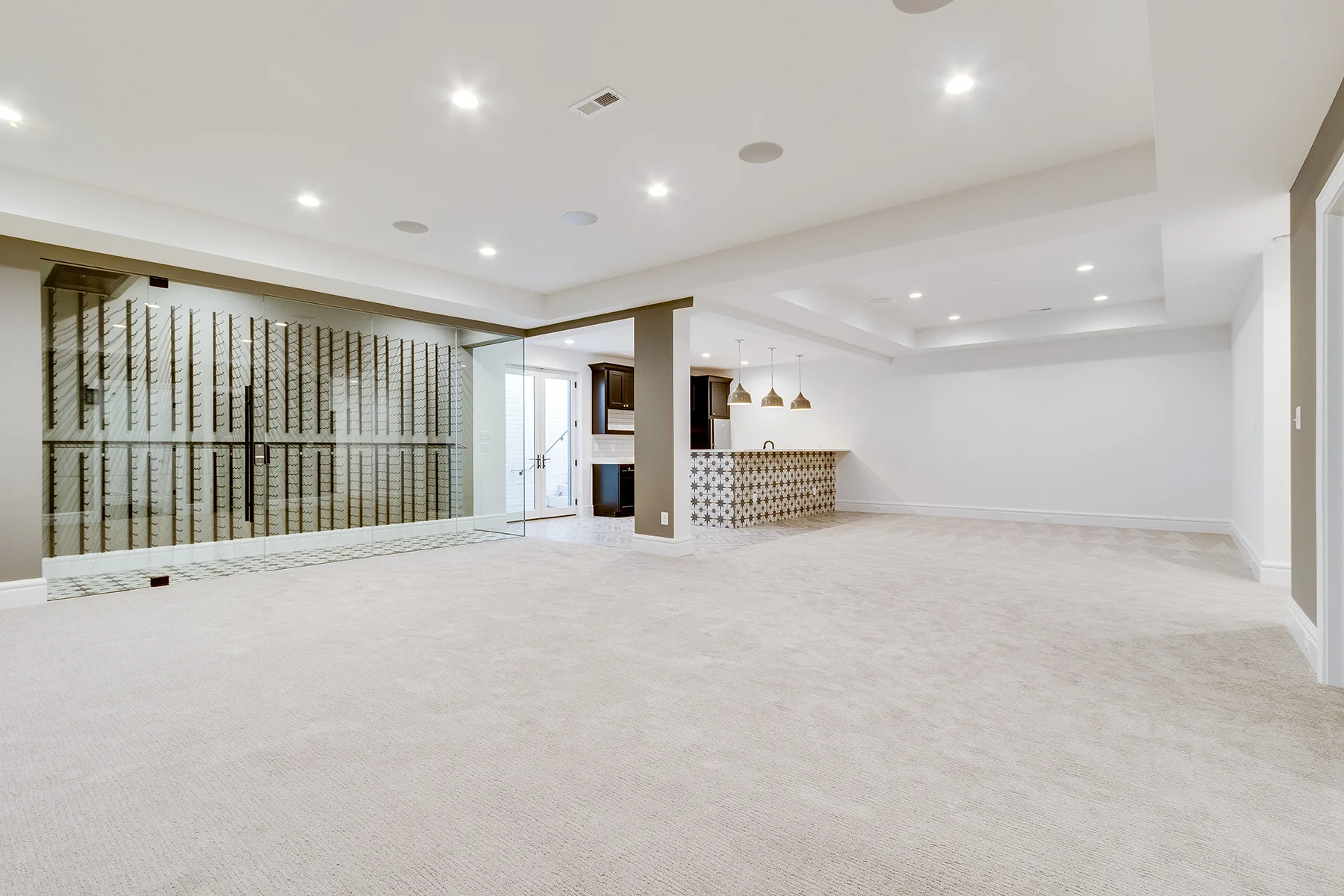 Large entertaining space in Multi Generational Home Plan, The Madison by Classic Cottages.