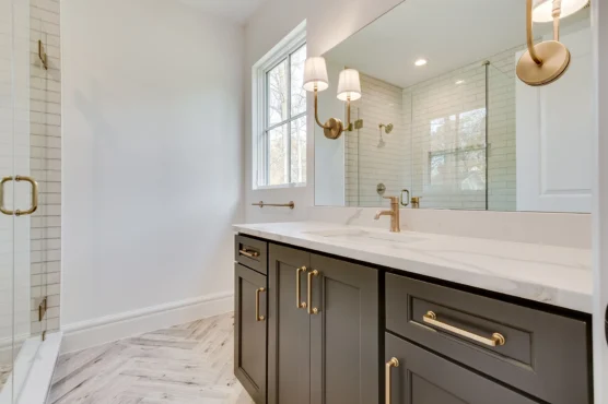 Large bathroom in Multi Generational Home Plan, The Madison by Classic Cottages.