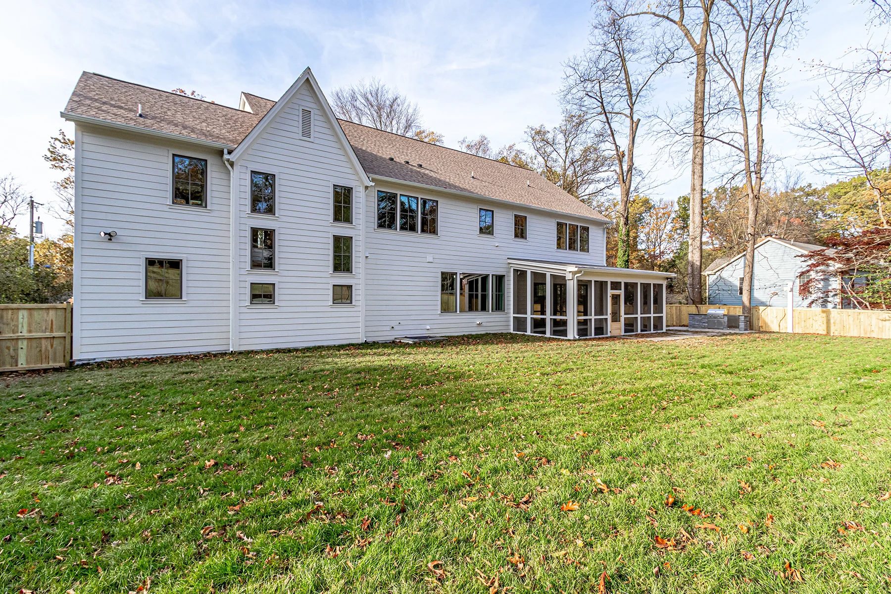 Backyard exterior of Multi Generational Home Plan, The Madison by Classic Cottages.