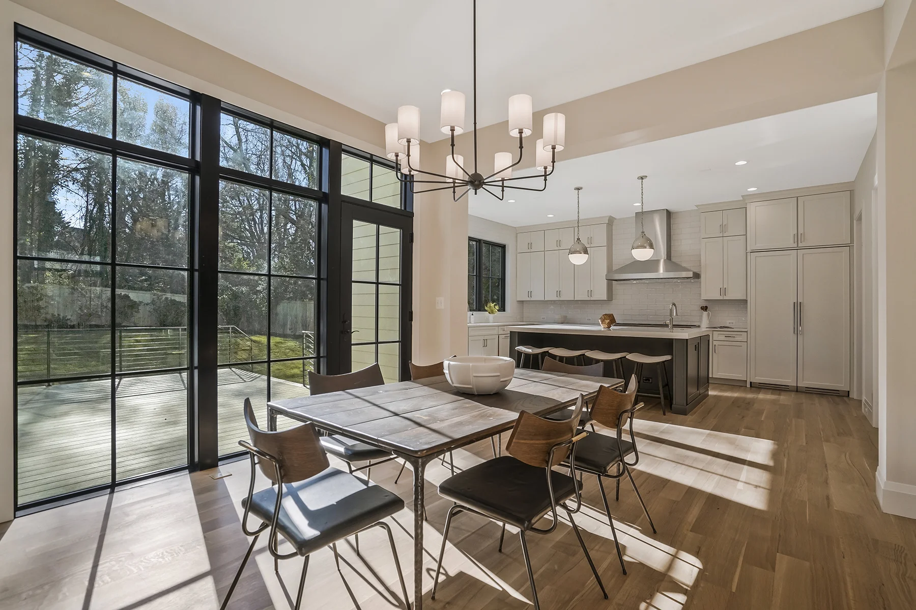 New Home Builder in Arlington Cali Style dining room table and lights