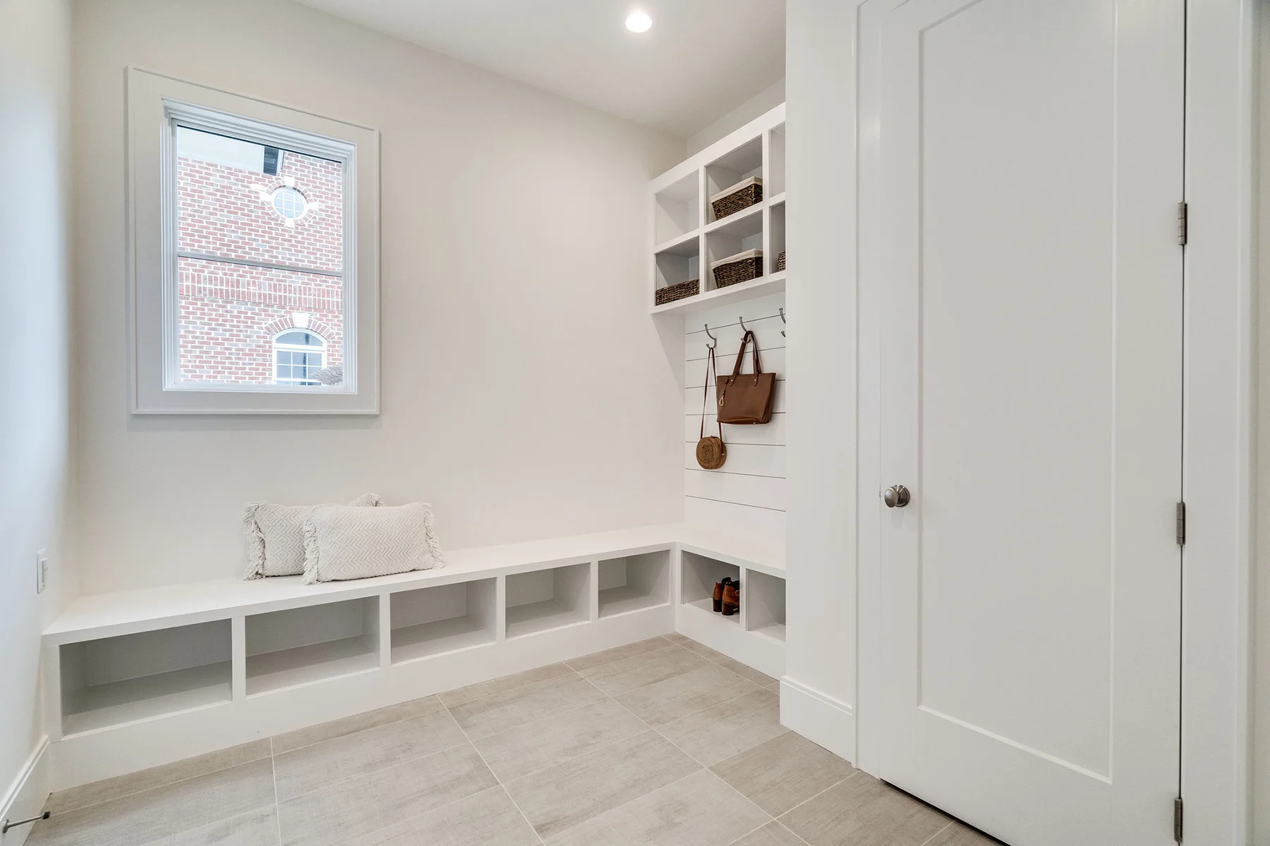 Ten Foot Ceilings, Arlington Luxury Home Plan, Ridgeview mud room with custom shelves