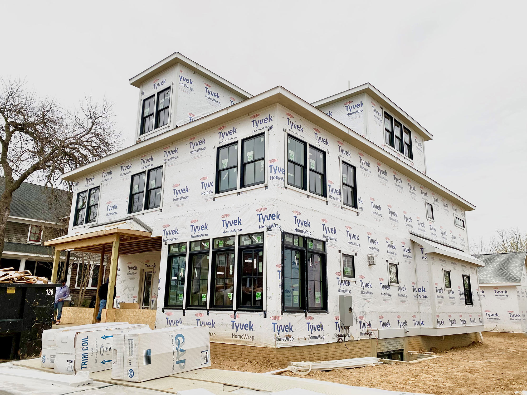 Classic Cottages custom home construction in Arlington VA featuring high-performance weather barrier.